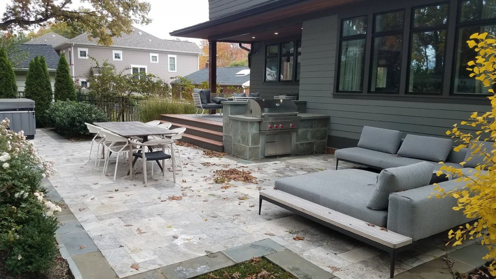 An outdoor patio with a lounge